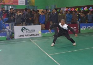 cm playing badminton