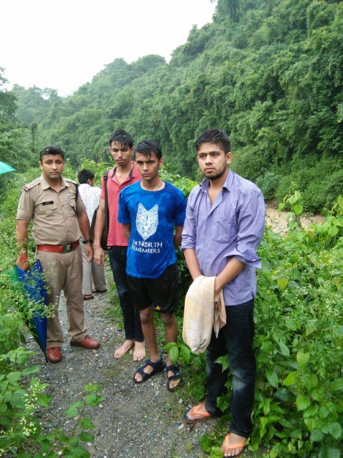 youths rescued from river by police